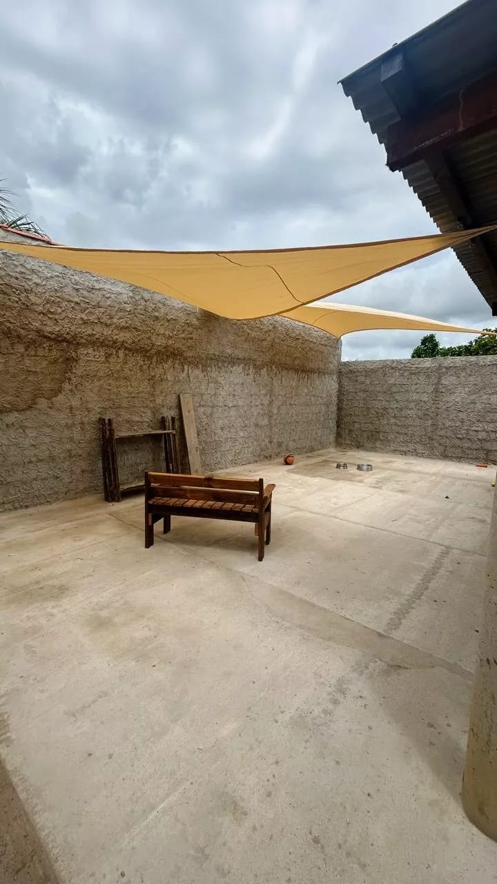 Customer photo review of Toldo Triangular Impermeável 420D Anti-UV para Áreas Externas