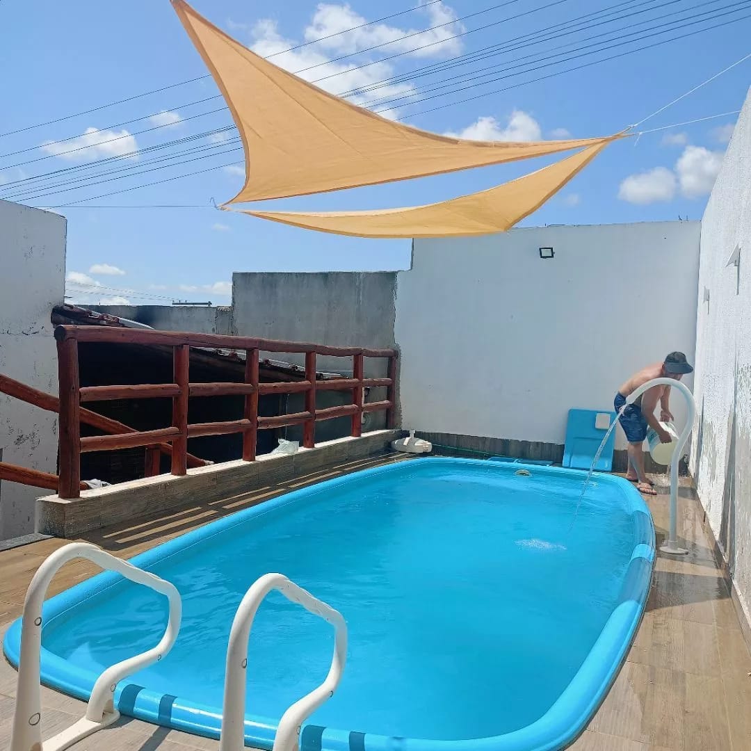 Customer photo review of Toldo Triangular Impermeável 420D Anti-UV para Áreas Externas