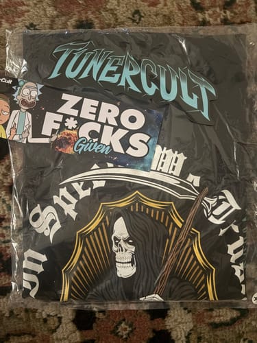 Customer photo review of MYSTERY TEE