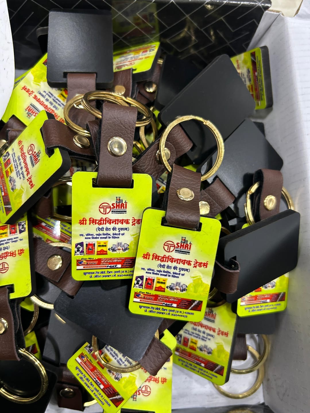 Customer photo review of Customized Premium Belt Keychains | Best for Brand Promotion | PrintMine.in