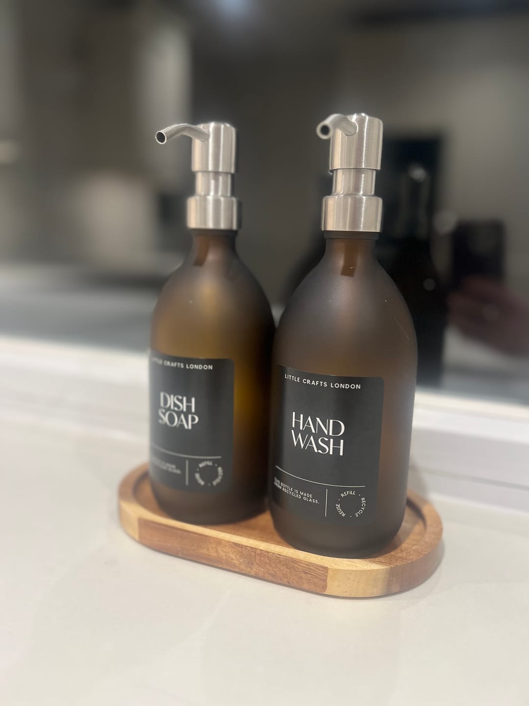Customer photo review of Set of 2 Frosted Amber Glass Bottle 500 ML with Metal Pump & Small Tray Black Label