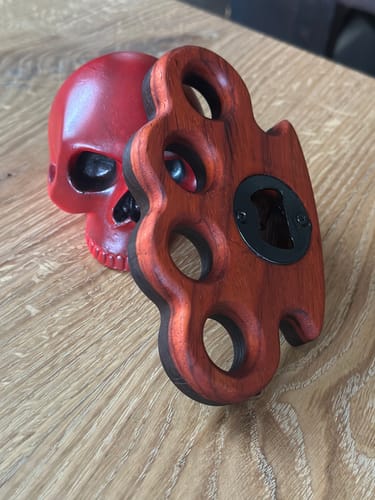 Customer photo review of 5.8x3.5" Brass Knuckles Bottle Opener Acrylic Router Template