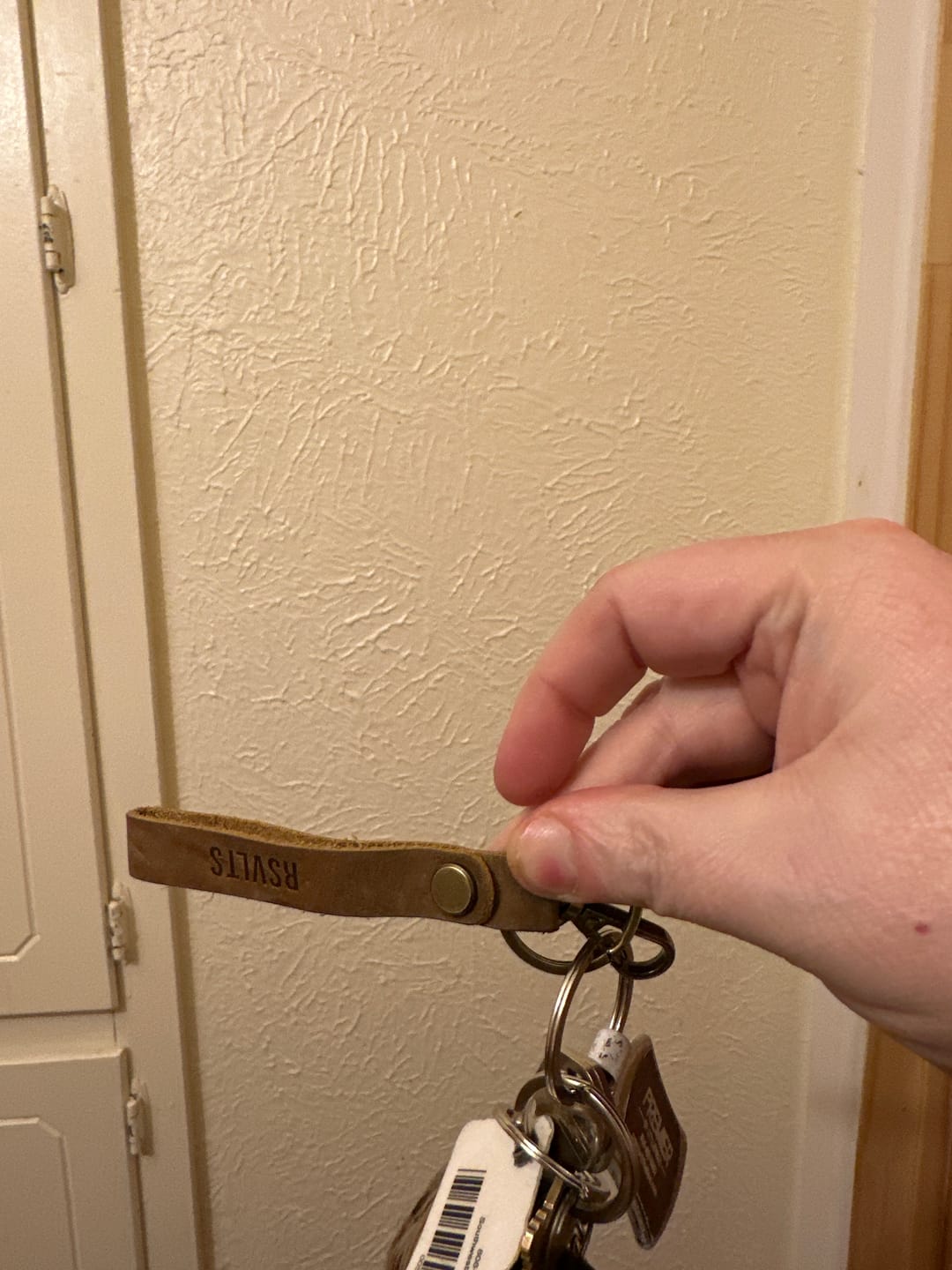 Customer photo review of Dare Mighty – Leather Keychain