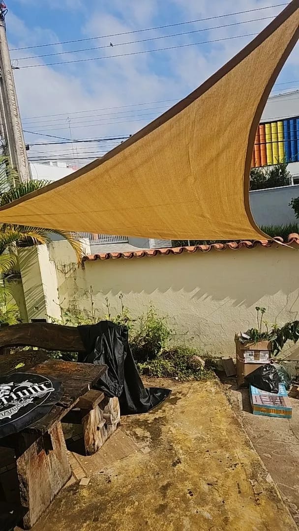 Customer photo review of Toldo Triangular Impermeável 420D Anti-UV para Áreas Externas