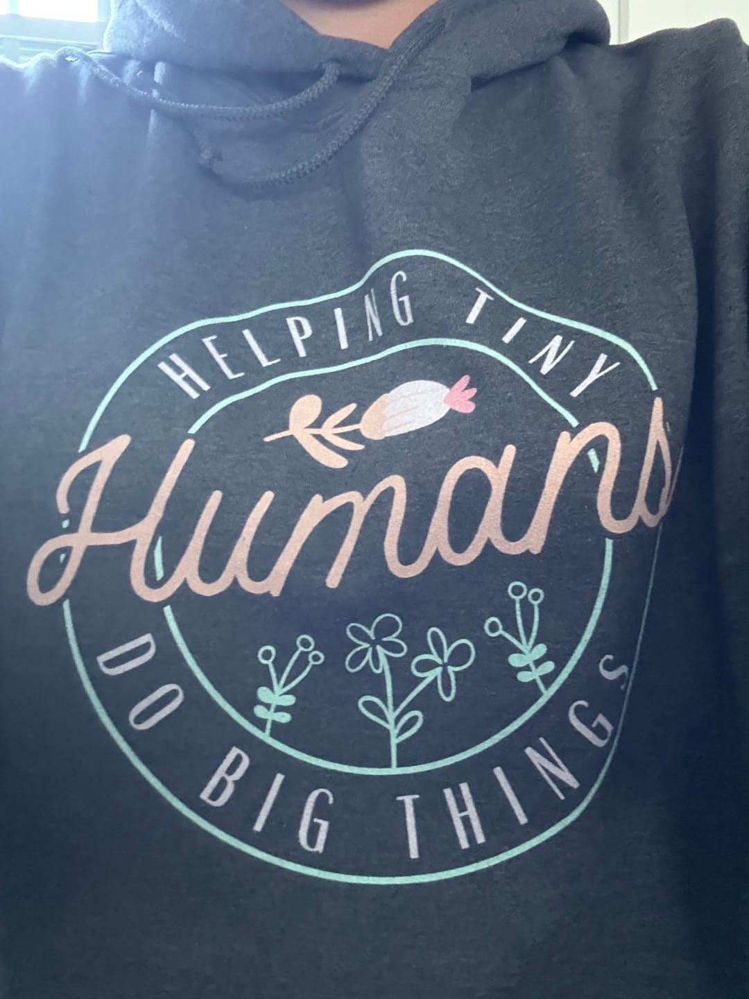 Customer photo review of Helping Tiny Humans Do Big Things Hoodie