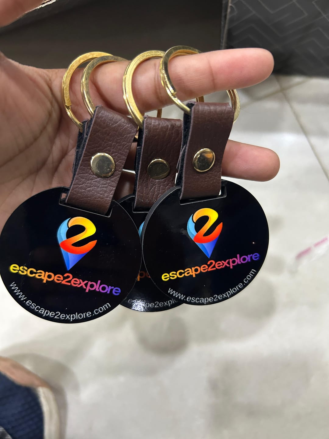 Customer photo review of Customized Premium Belt Keychains | Best for Brand Promotion | PrintMine.in