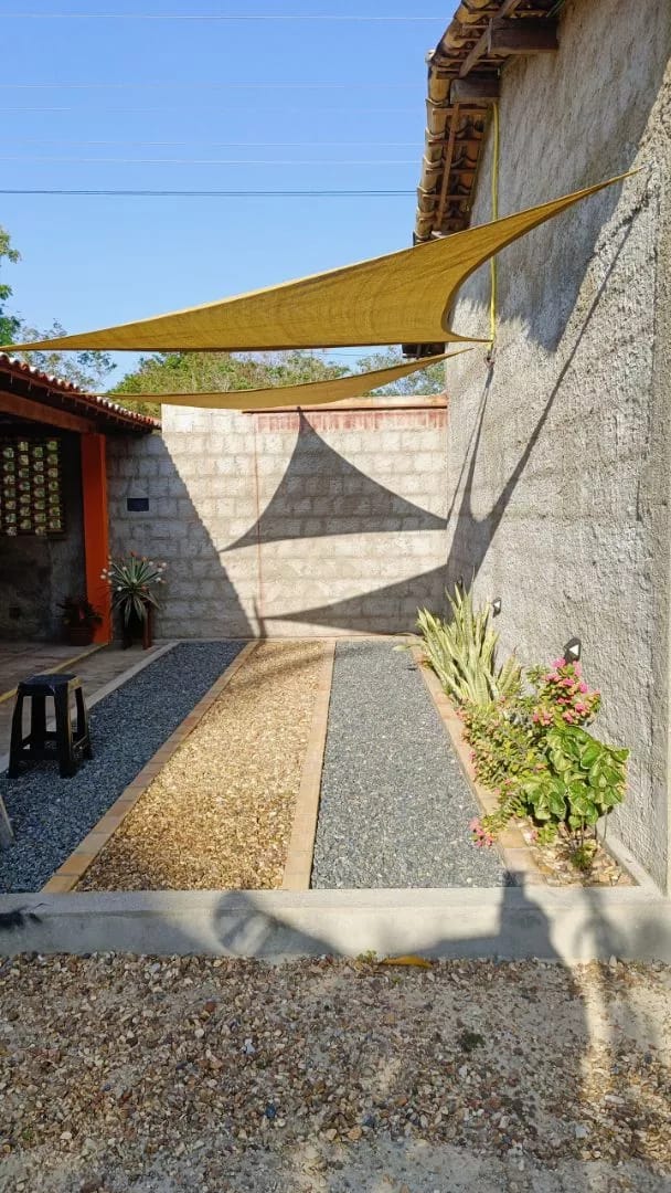 Customer photo review of Toldo Triangular Impermeável 420D Anti-UV para Áreas Externas