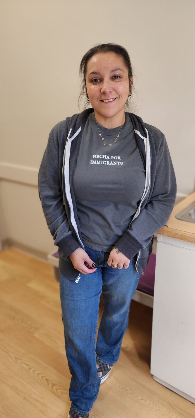 Customer photo review of 'Hecha Por Immigrants' Embroidered Grey Shirt