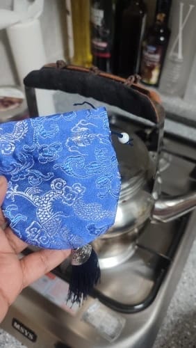 Customer photo review of Cubierta de mango para tetera, soporte para tetera, hervidor caliente, cubiertas para sartén de té, tela para tetera, sartén con agarre térmico, resistente al calor, antisoportes de cocina