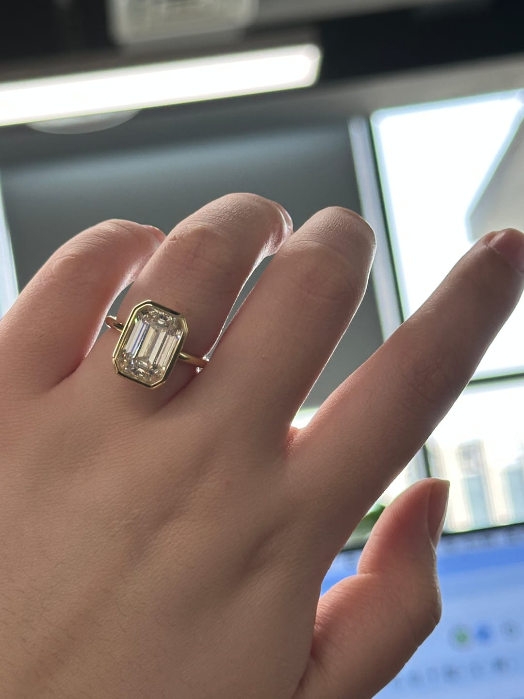 Customer photo review of Louily Unique Yellow Gold Emerald Cut Bezel Engagement Ring In Sterling Silver