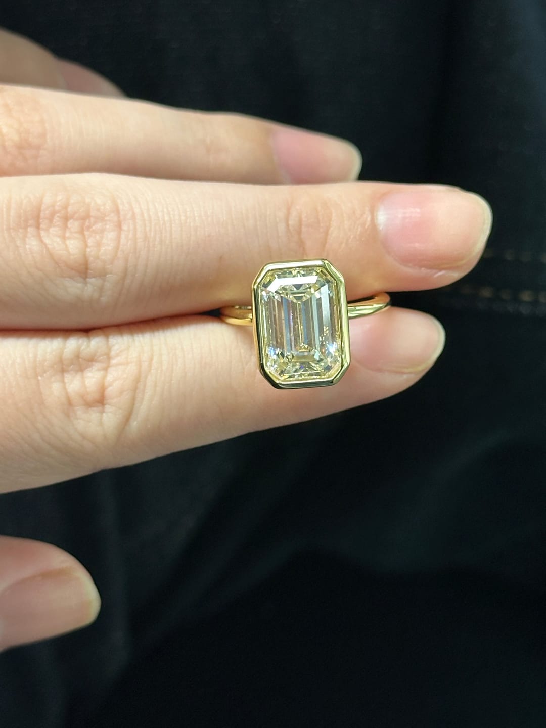 Customer photo review of Louily Unique Yellow Gold Emerald Cut Bezel Engagement Ring In Sterling Silver