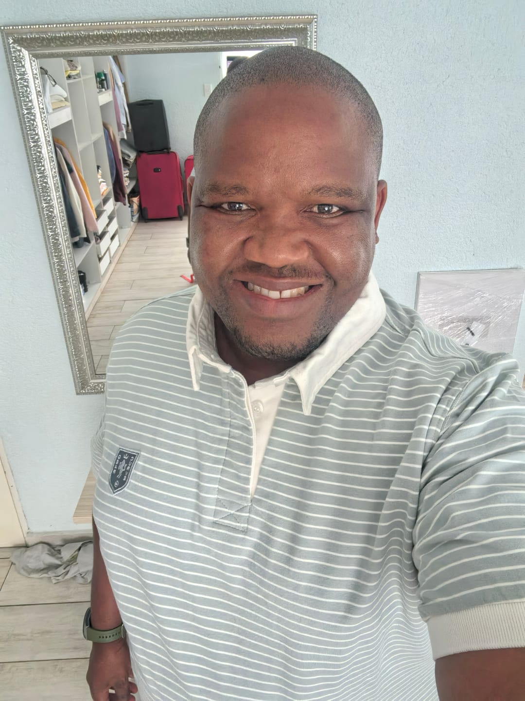 Customer photo review of Elite Rugby Polo Aqua & Cream Stripe