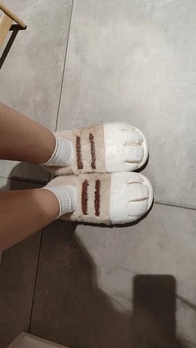 Customer photo review of Warm 3D Cat Paws Furry Slippers
