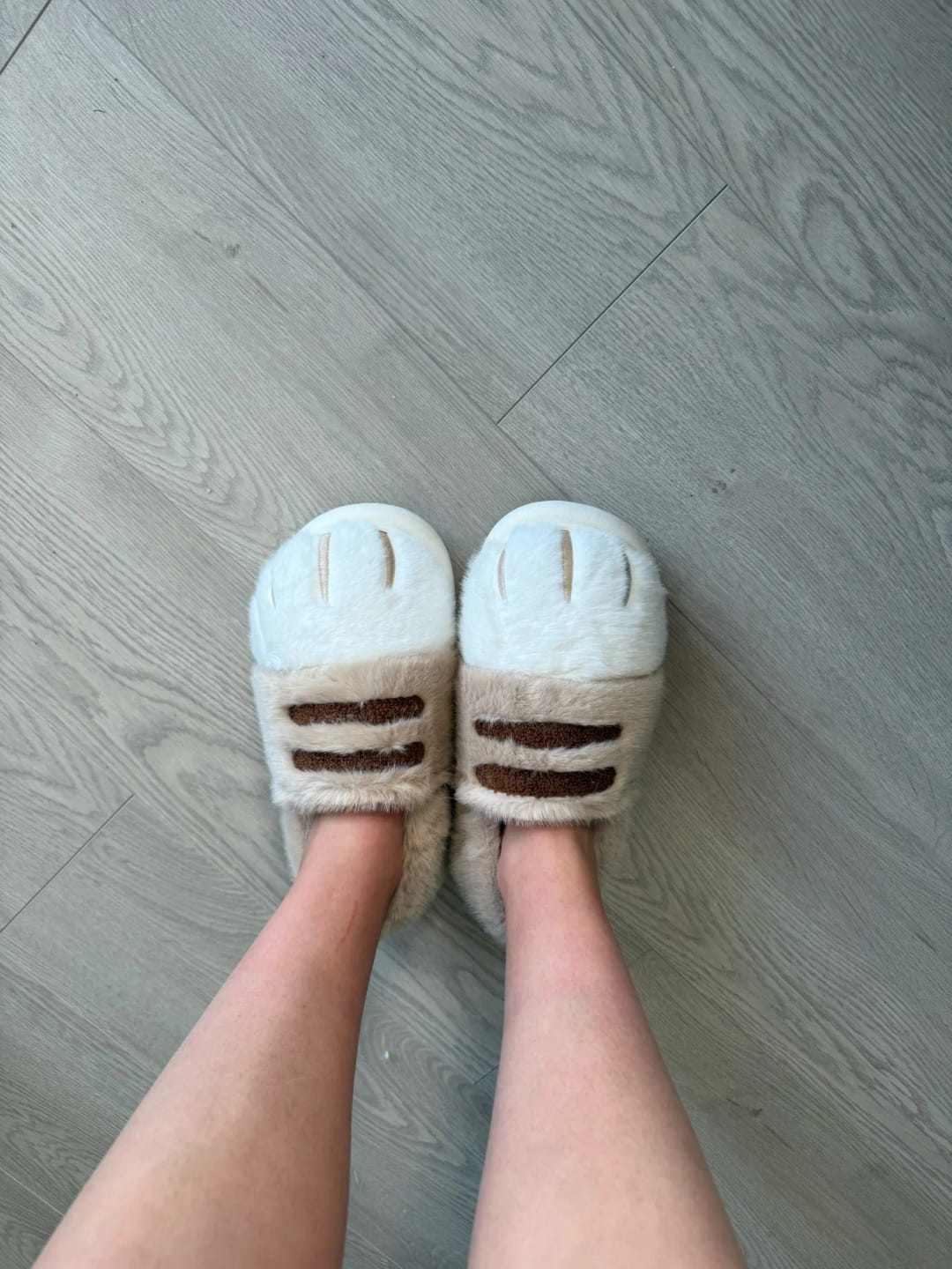 Customer photo review of Warm 3D Cat Paws Furry Slippers