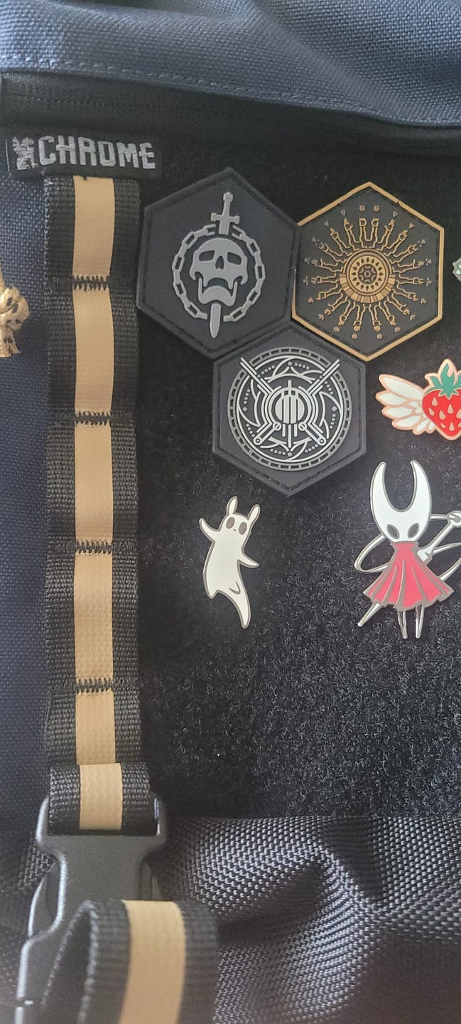 Customer photo review of Rain World - Slugcat Pin