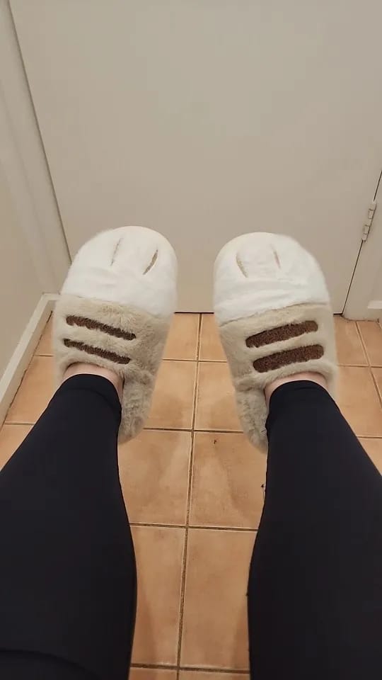 Customer photo review of Warm 3D Cat Paws Furry Slippers
