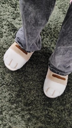 Customer photo review of Warm 3D Cat Paws Furry Slippers
