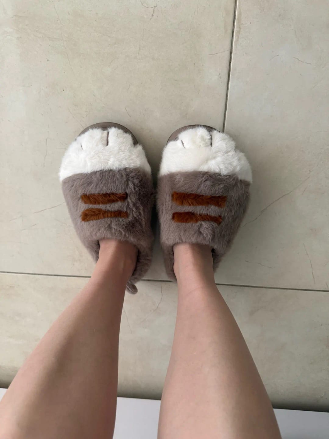 Customer photo review of Warm 3D Cat Paws Furry Slippers