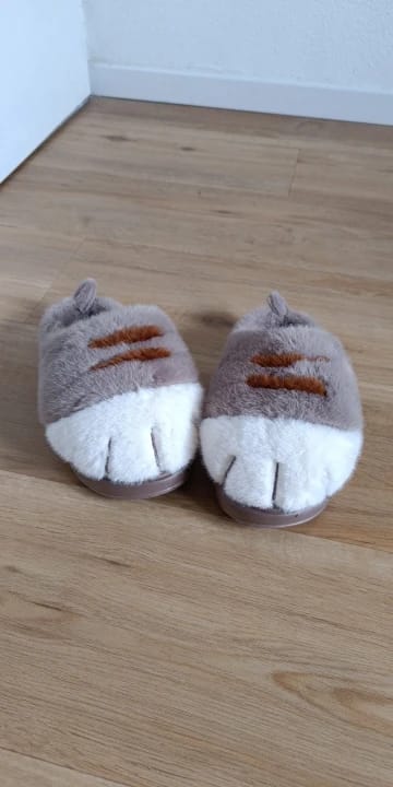 Customer photo review of Warm 3D Cat Paws Furry Slippers