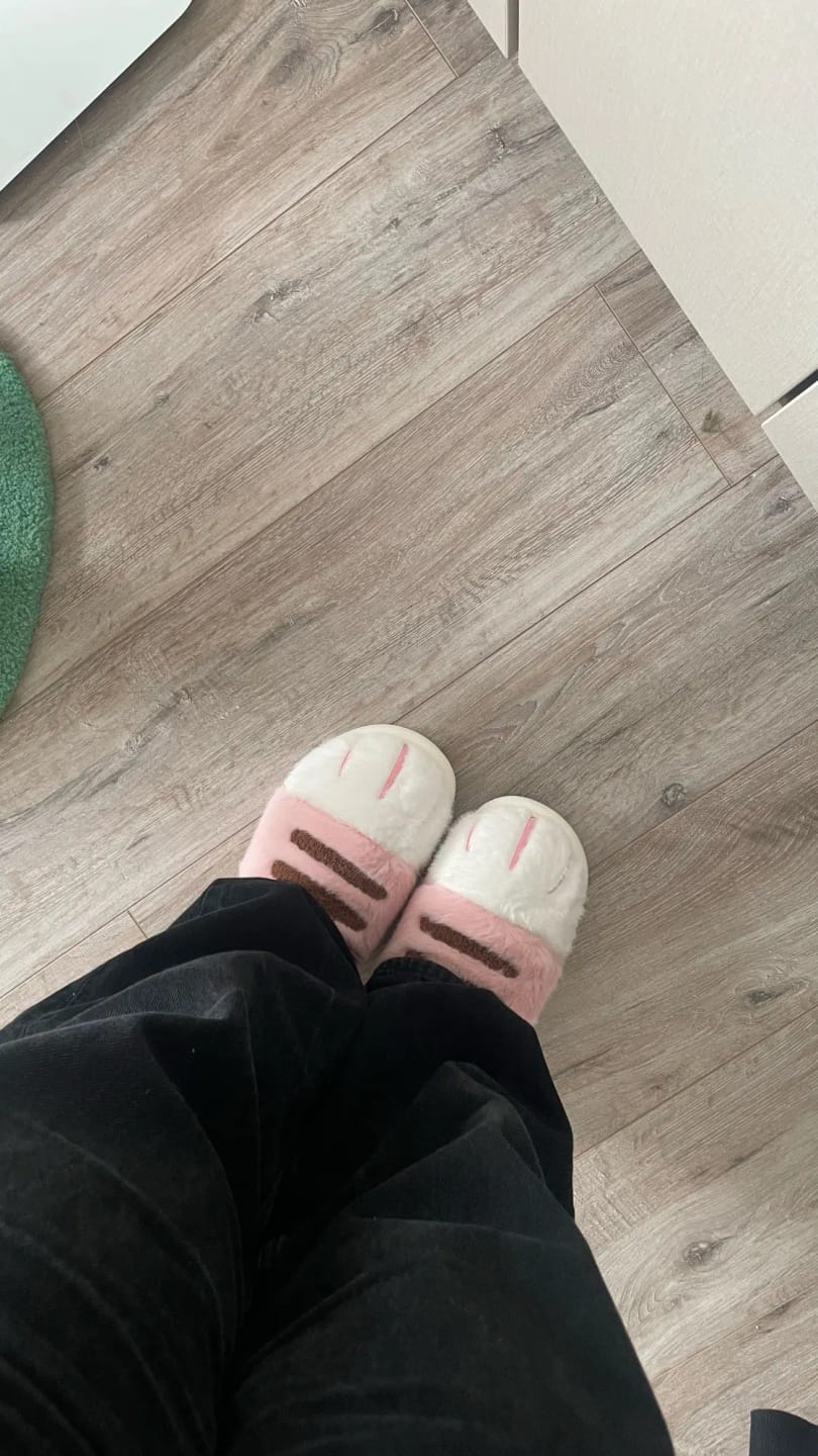 Customer photo review of Warm 3D Cat Paws Furry Slippers