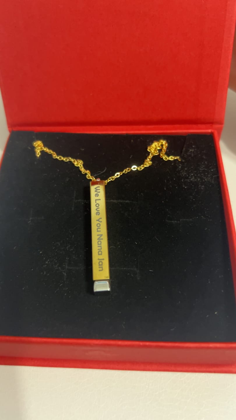 Customer photo review of Custom Text Engraved Secret Message Necklace