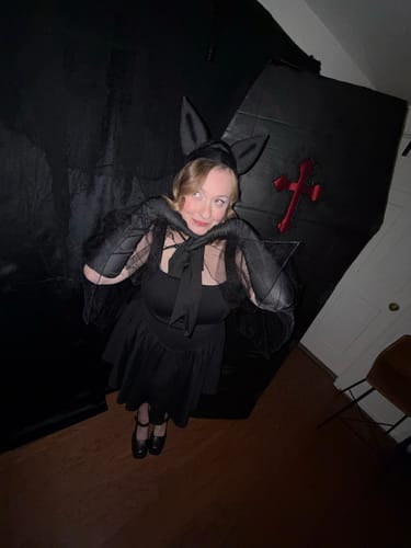 Customer photo review of Bombshell Swing Dress in Black MINI - Vixen by Micheline Pitt