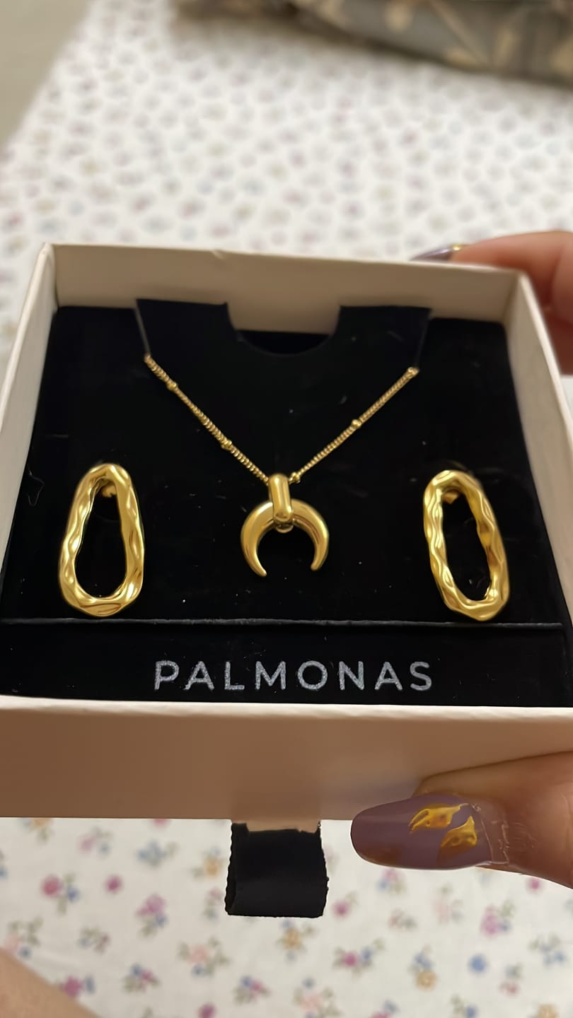 Customer photo review of Tiny Horn Necklace