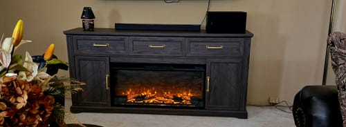 Customer photo review of 68" Grooved Door Farmhouse Fireplace TV Stand