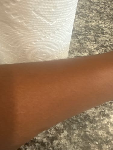 Customer photo review of Fair and White So White Brightening Body Oil with Sweet Almond Oil 250 ml / 8.4 fl oz