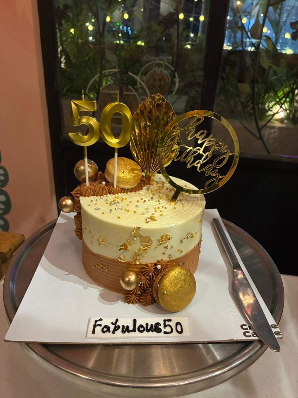 Customer photo review of Golden cake for boyfriend birthday
