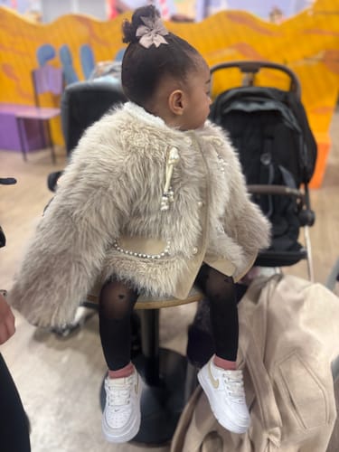 Customer photo review of Girls Faux Fur Plush Warm Princess Coat