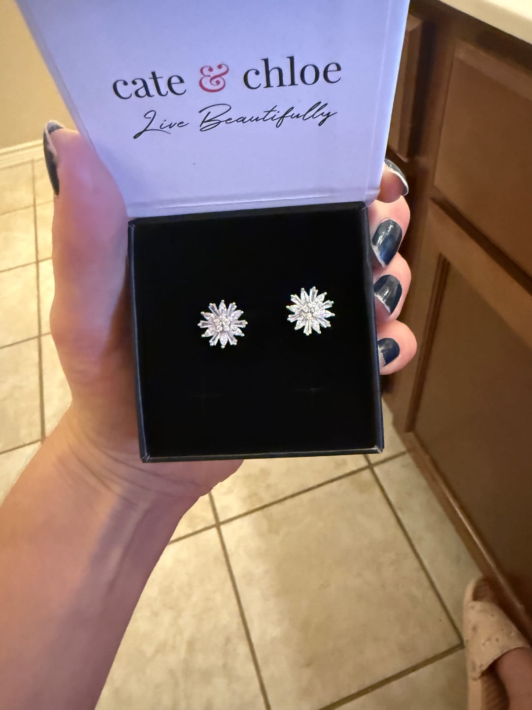 Customer photo review of Astara 18k White Gold Plated Stud Earrings with Simulated Diamond Crystals