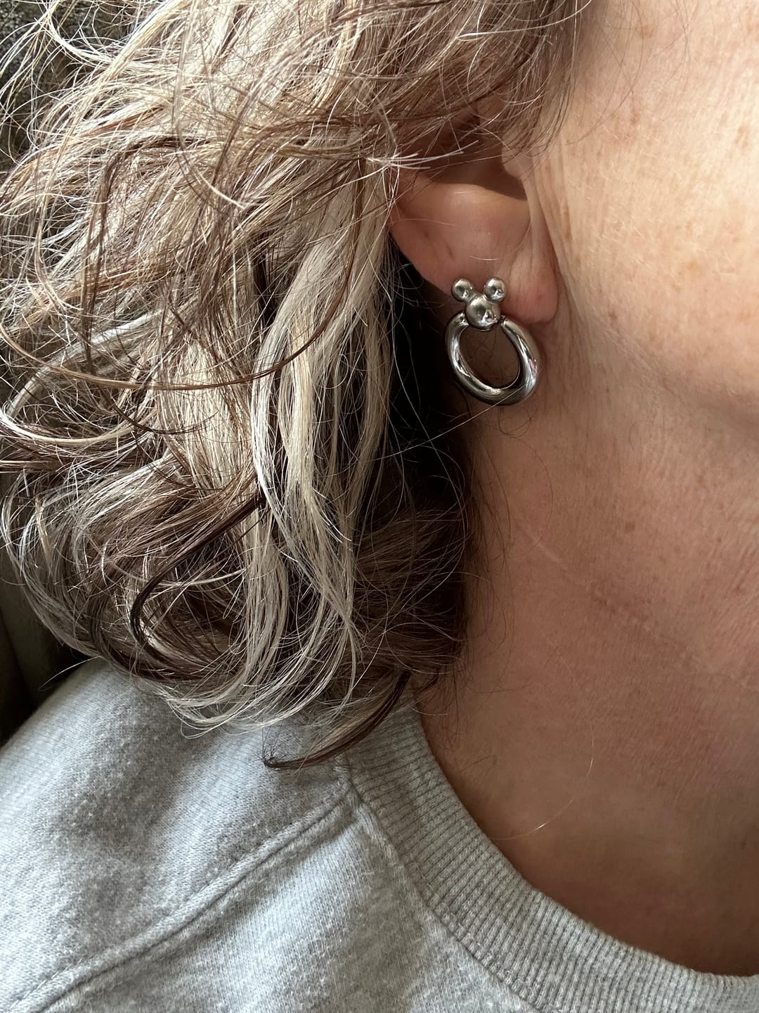 Customer photo review of Leader of the Club Earrings