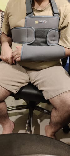 Customer photo review of Shoulder Immobilizer | Provides Firm Support for Shoulder Dislocation & Relieves Pain (Grey)