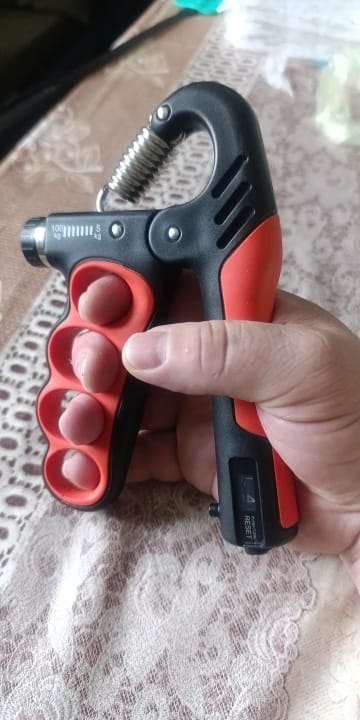 Customer photo review of SteelFlex™ Adjustable Grip Trainer – 11–220 lbs Hand Strength Builder
