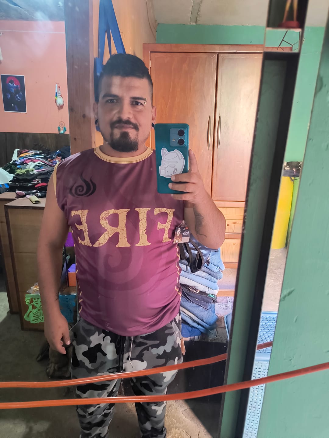 Customer photo review of Playera Sin Mangas Nación Del Fuego