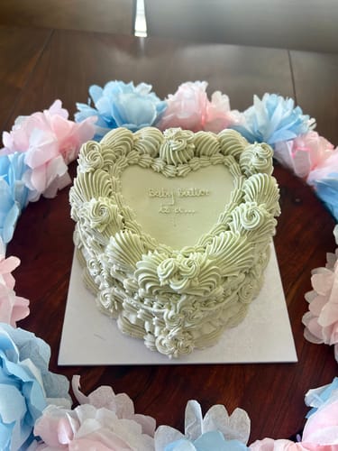 Customer photo review of gender reveal cake
