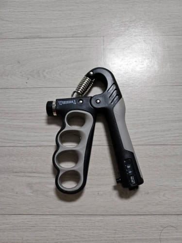 Customer photo review of SteelFlex™ Adjustable Grip Trainer – 11–220 lbs Hand Strength Builder
