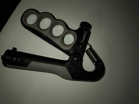 Customer photo review of SteelFlex™ Adjustable Grip Trainer – 11–220 lbs Hand Strength Builder
