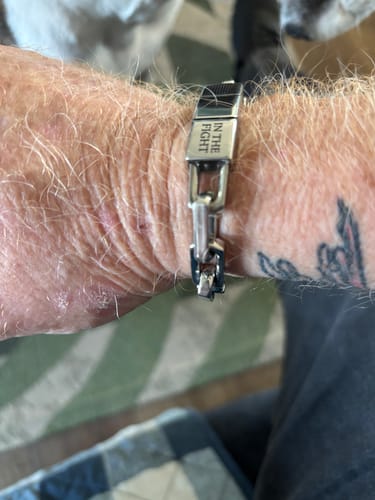 Customer photo review of In The Fight-Never Surrender Bracelet : Helps Pair Veterans With A Service Dog or Shelter Dog