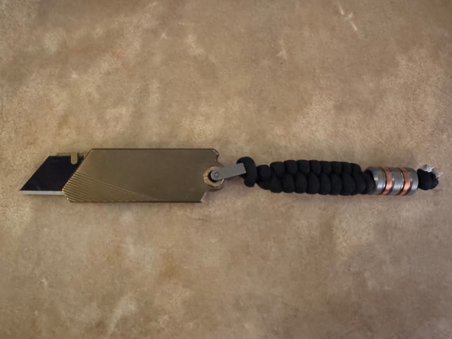 Customer photo review of Terra Hammer—Knife Bead With Lanyard