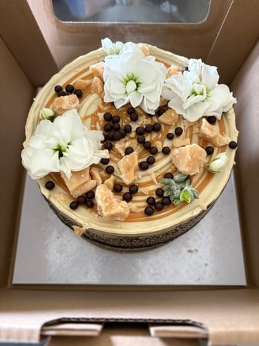 Customer photo review of chocolate caramel cake