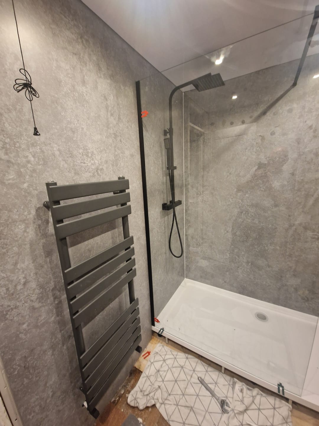 Customer photo review of Premium Grey Concrete Matt Shower Wall Panel – 1M x 2.4M