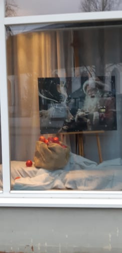 Customer photo review of Poster | Weihnachtsmann füttert Rentier | Querformat