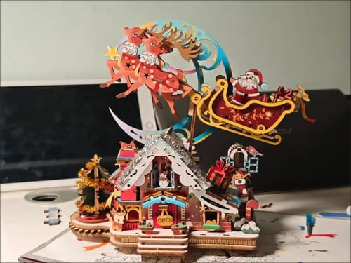 Customer photo review of Festive Rotating Santa Sleigh Music Box
