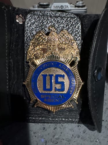 Customer photo review of US Police Badge Cop Brooch Lapel Pin Mini Version (7 Optional Styles)