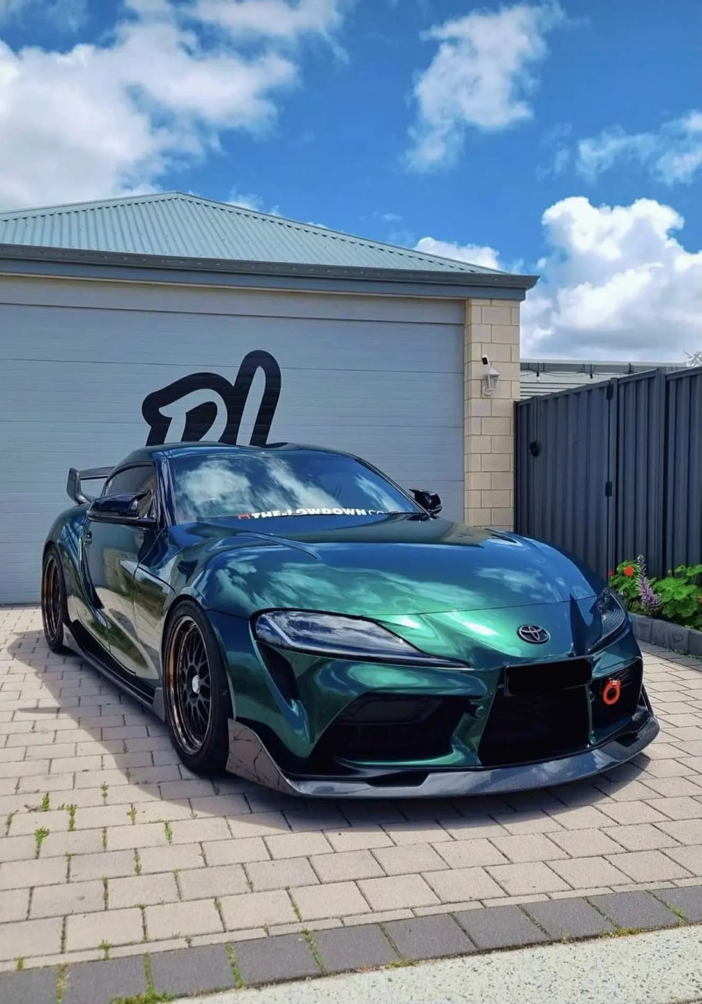 Customer photo review of Mallcas™ Glossy Metallic Agate Green Vinyl Wrap (PET Liner)