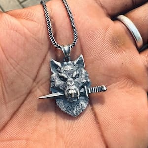 Customer photo review of Wolf Knife Pendant