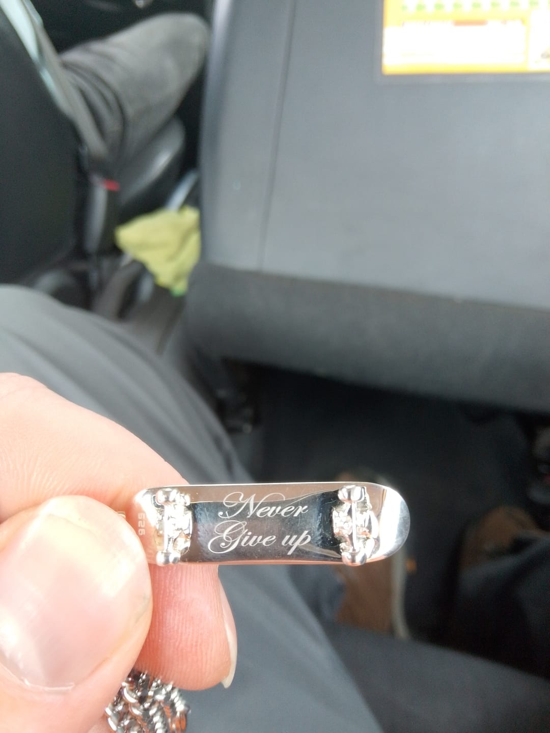 Customer photo review of Personalized Skateboard Pendant (Silver)