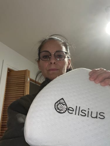 Avis photo d'un client sur Coussin Orthopédique Genoux Cellsius - Le secret d'un sommeil sans douleur